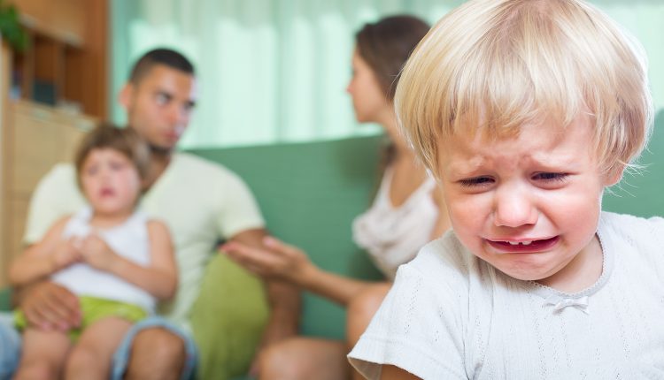 Couple with children having quarrel