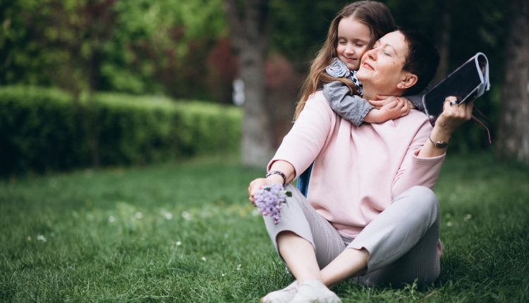 Grandmother and grandchild in park