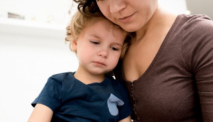 Mother Calming Crying Son