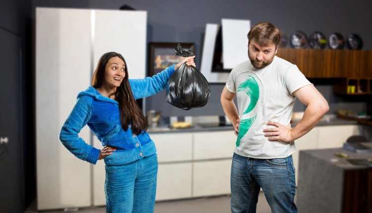 Wife asking her husband to take out the trash