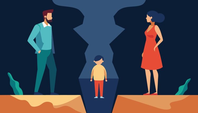 Two family members standing on either side of a room with a growing chasm between them representing the rift caused by their emotional walls.