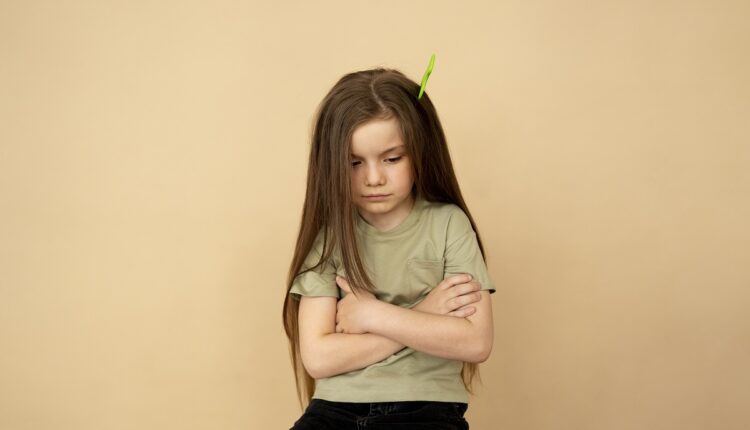 sad-girl-with-hair-comb-front-view